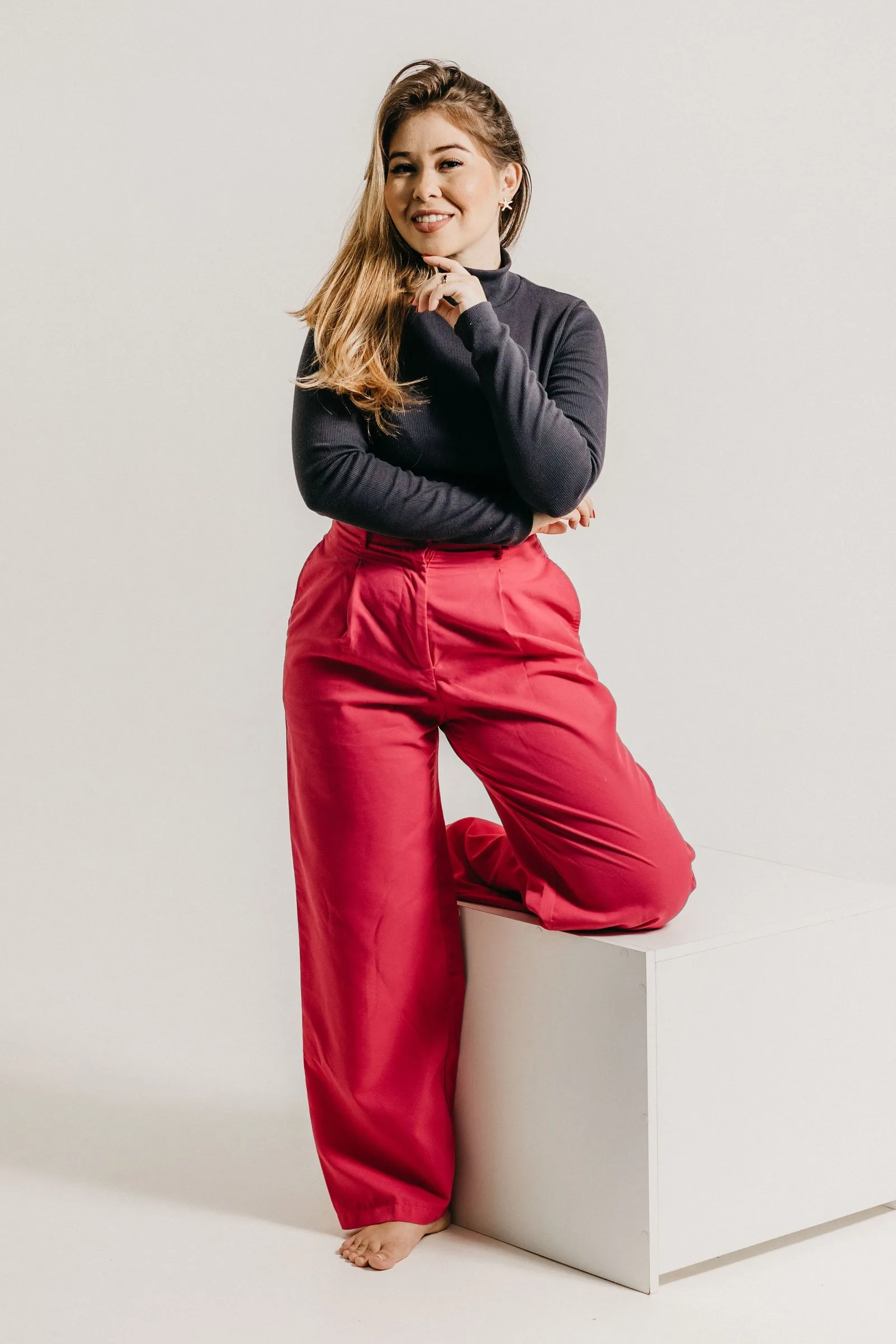 scarlet pleat trousers