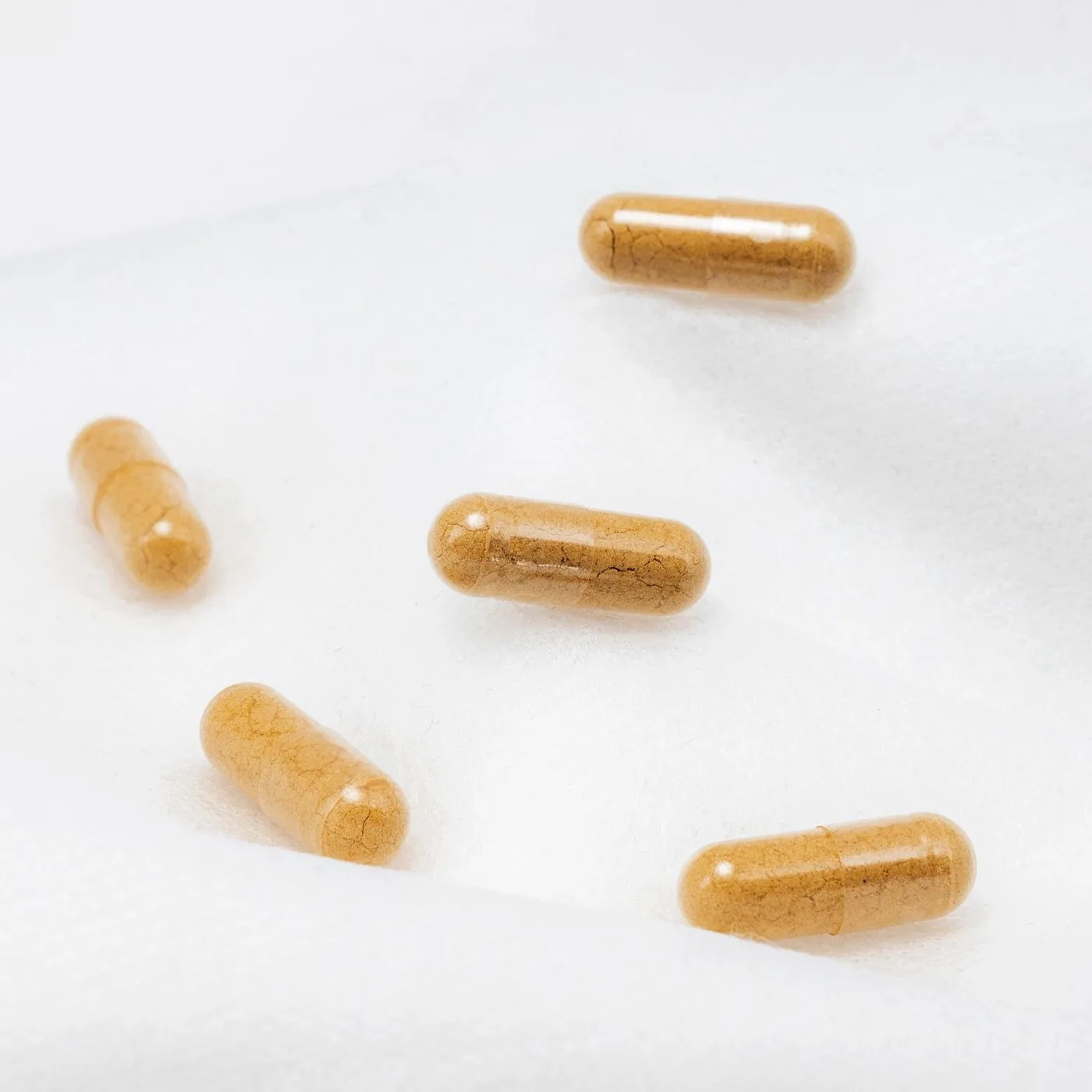 Capsules on a white ground
