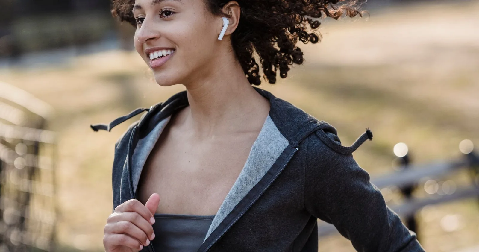 A runner with wireless earbuds