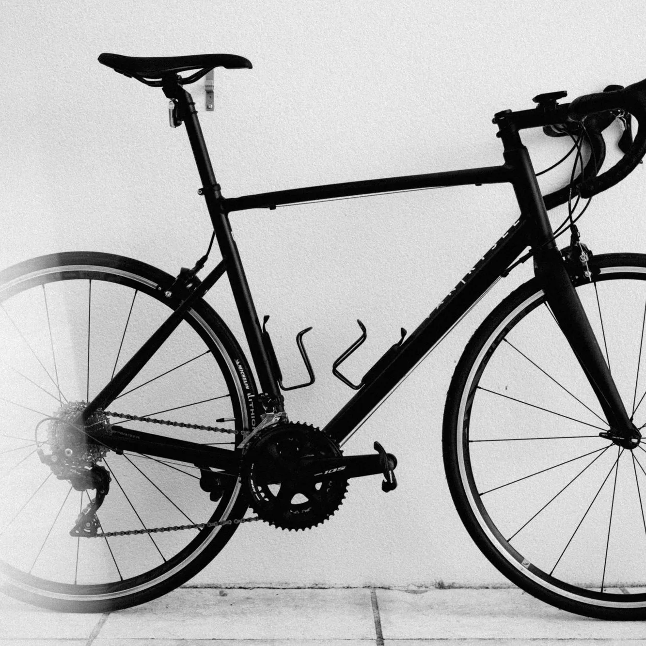 Black sport bike on a white ground