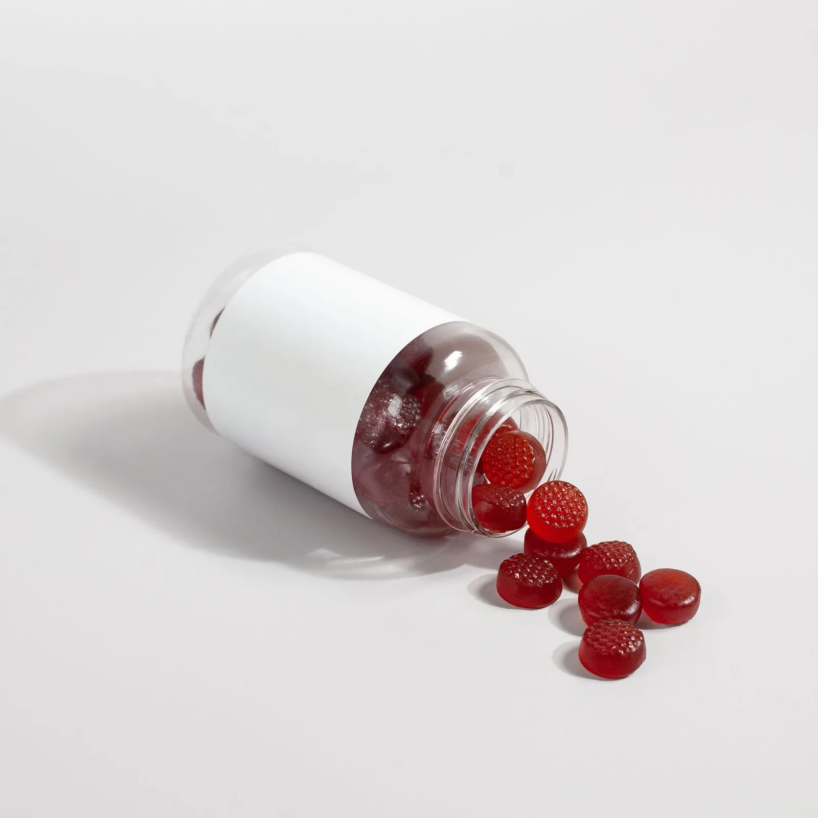 Gummies spilled from a jar