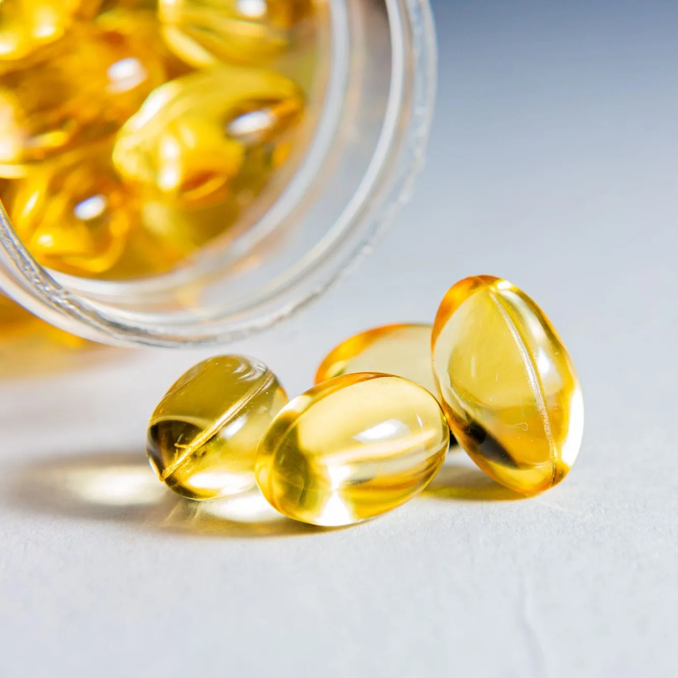 Golden softgels close up