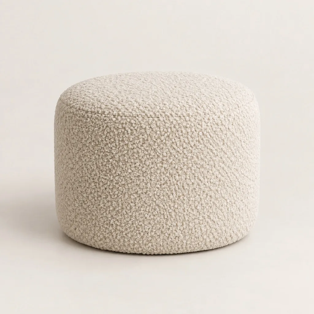 Alma round pouf in bouclé
