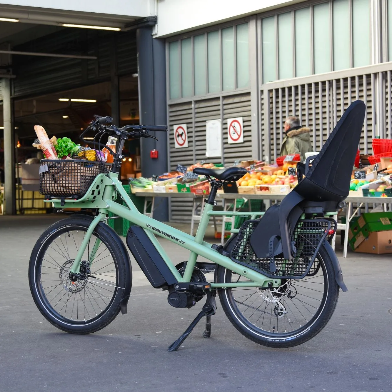 Long-tail e-bike loaded with groceries