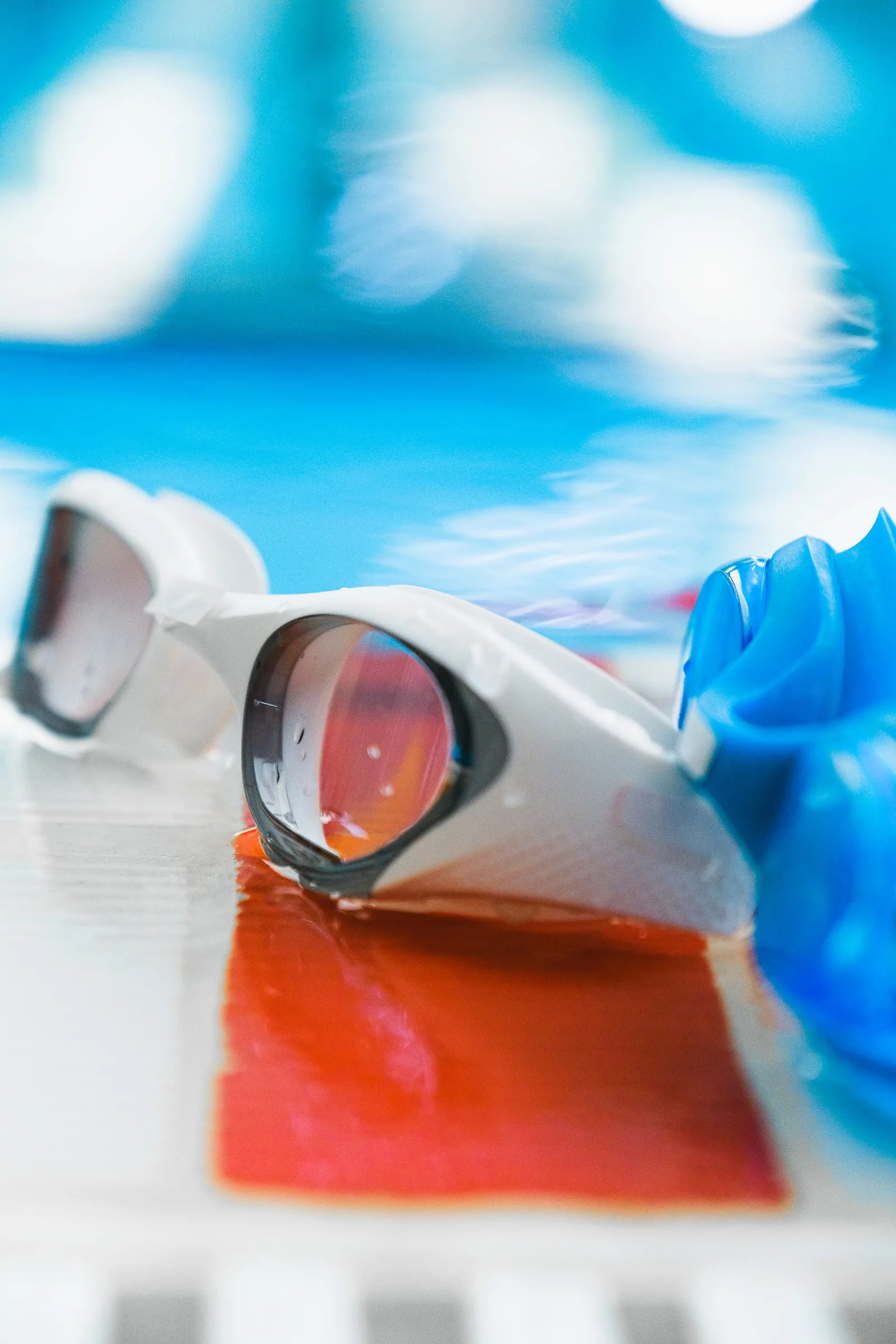 pool goggles and cap