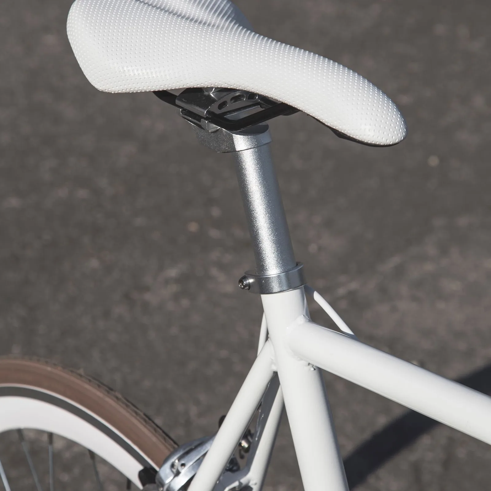 White saddle on a white frame